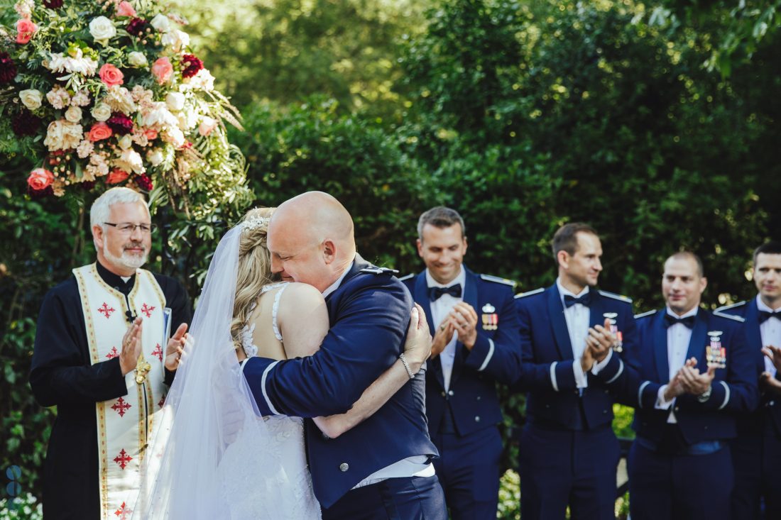 Chris giving Anna a hug after they are officially announced husband and wife - Napa Valley Wedding Photography