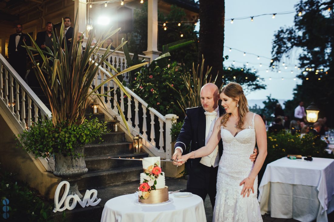 Bride and Groom cutting the cake - Napa Valley Wedding Photography