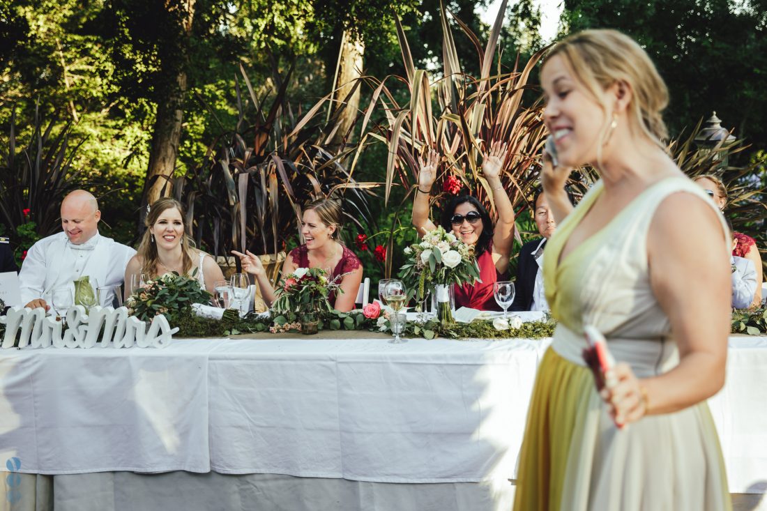 Maid of Honor giving a speech to Chris and Anna at the wedding reception