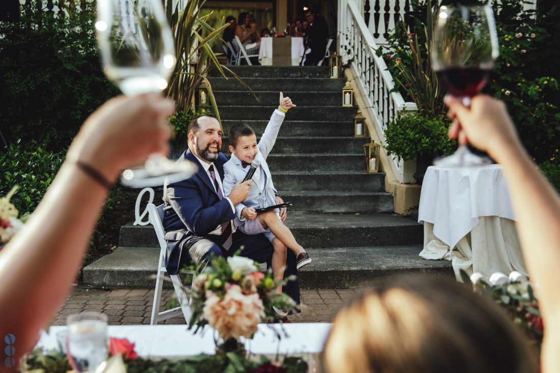 Groom's nephew giving a speech to the bride and groom.