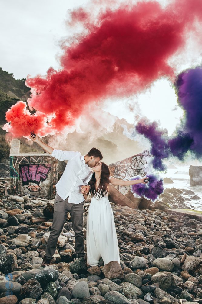 Colored Smoke Bomb Engagement photography on the beach with Sahil & Natasha.