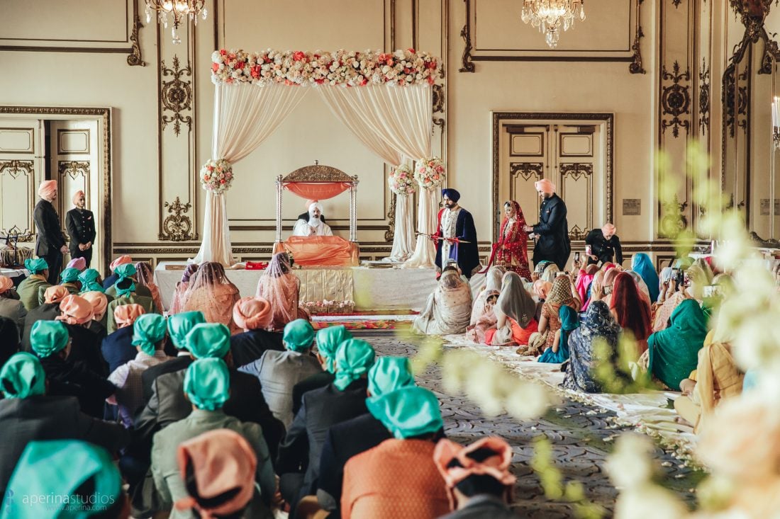 Sikh Indian wedding ceremony of bride and groom in the Gold Room of Fairmont San Francisco