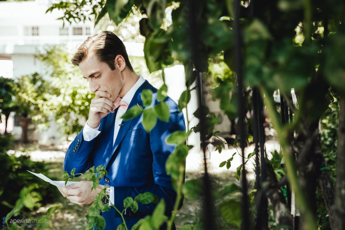 Wedding Photographer - Groom reading note