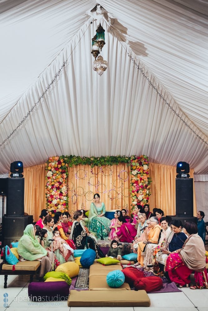 Bride and her family on the wedding Sangeet - Vibrant Tent Sangeet 