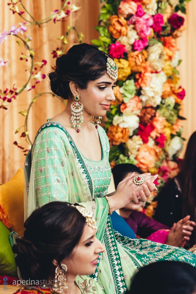 Bride and her family on the wedding Sangeet - Vibrant Tent Sangeet 