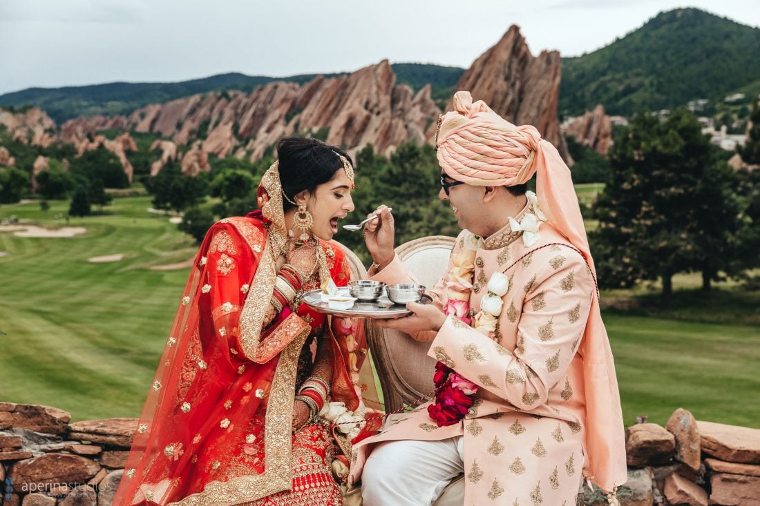 Denver Indian Wedding Photography by Aperina Studios - beautiful Hindu ceremony moments with Red, white and pink color scheme.